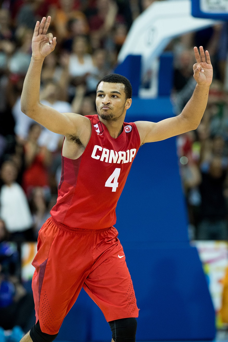 Jamal Murray of team Canada reacts to hitting a three pointer in the forth quarter against the United States in a semi-final men’s basketball game as part of the Pan Am Games in Toronto.  Canada beat the United States 111-108 in overtime.