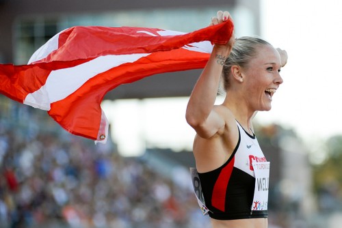 Sarah Wells of Canada reacts to finishing second in the women’s 400m hurdles final on Wednesday at the CIBC Athletics Stadium as part of the Pan Am Games 2015 in Toronto.