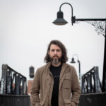 Singer songwriter musician photography Toronto. Junction backdrop.