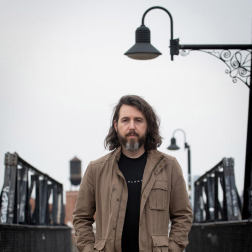 Singer songwriter musician photography Toronto. Junction backdrop.